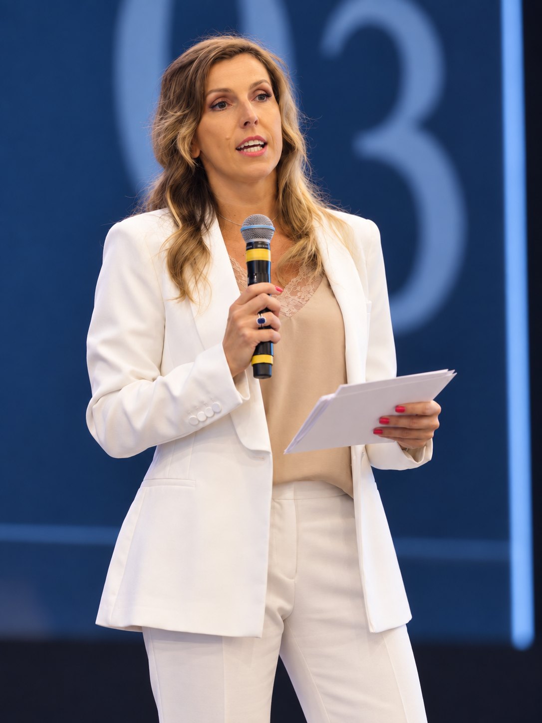 Kasia Biernacka speaking on stage